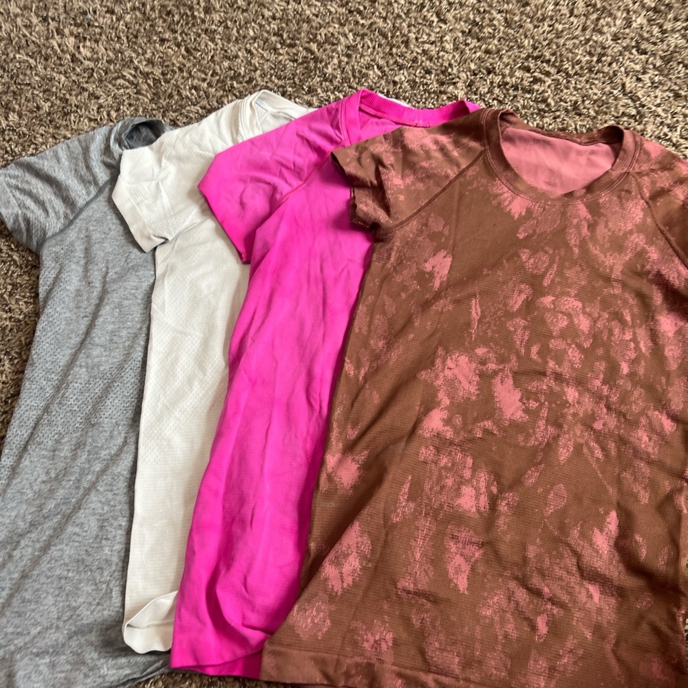 Set of Four lululemon swiftly techs in Gray, White, Pink, and Brown